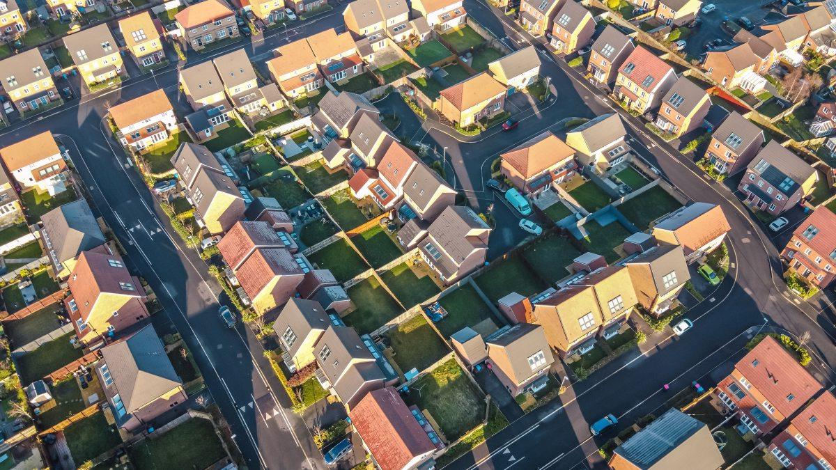 Aerial view of a neighborhood of family homes.