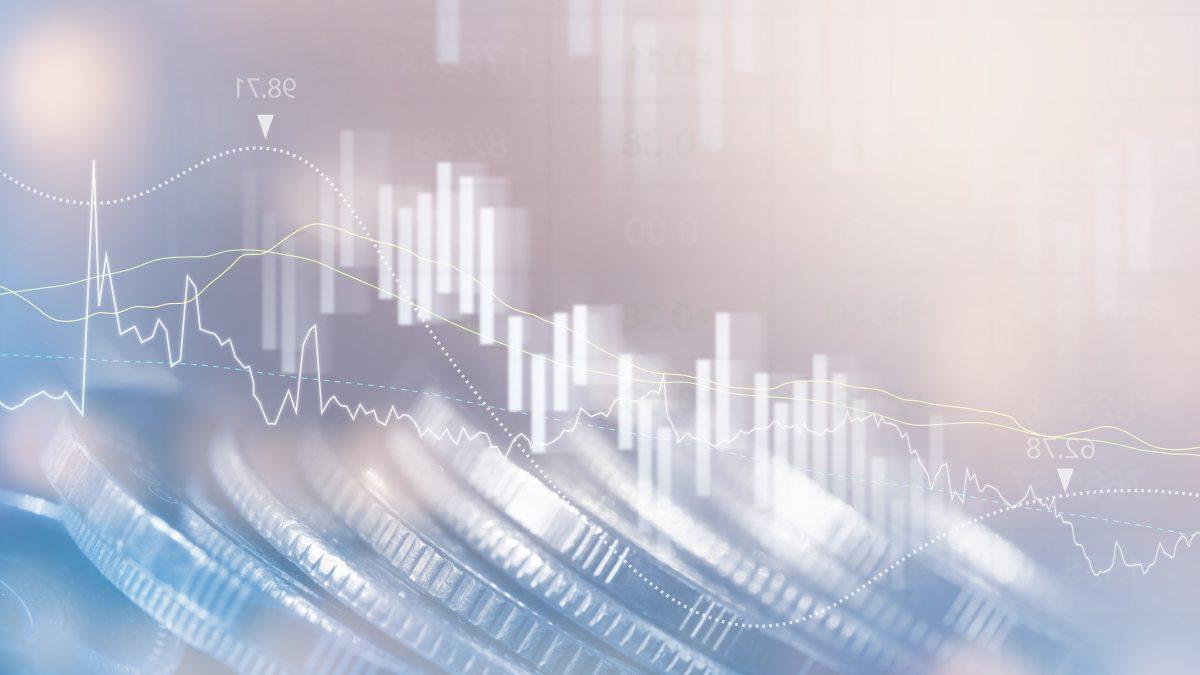 Finance and business graphic with stock market report, financial graph and rows of coins.